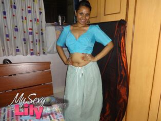Desi solo lady Lily in a micro-skirt flashes her nude..